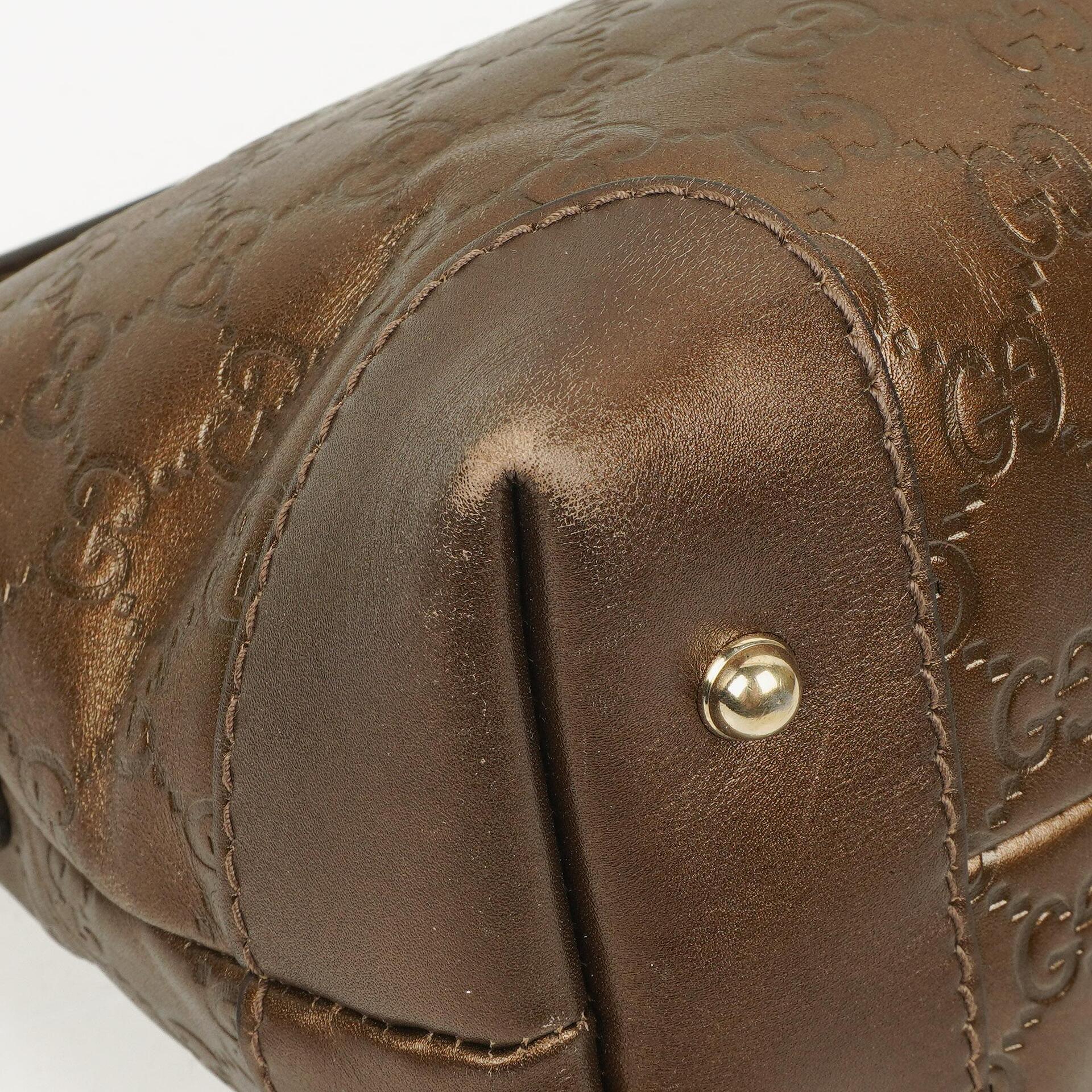 Gucci Heart Bit Hobo-Tasche aus bronzefarbenem Metallic Guccissima Leder