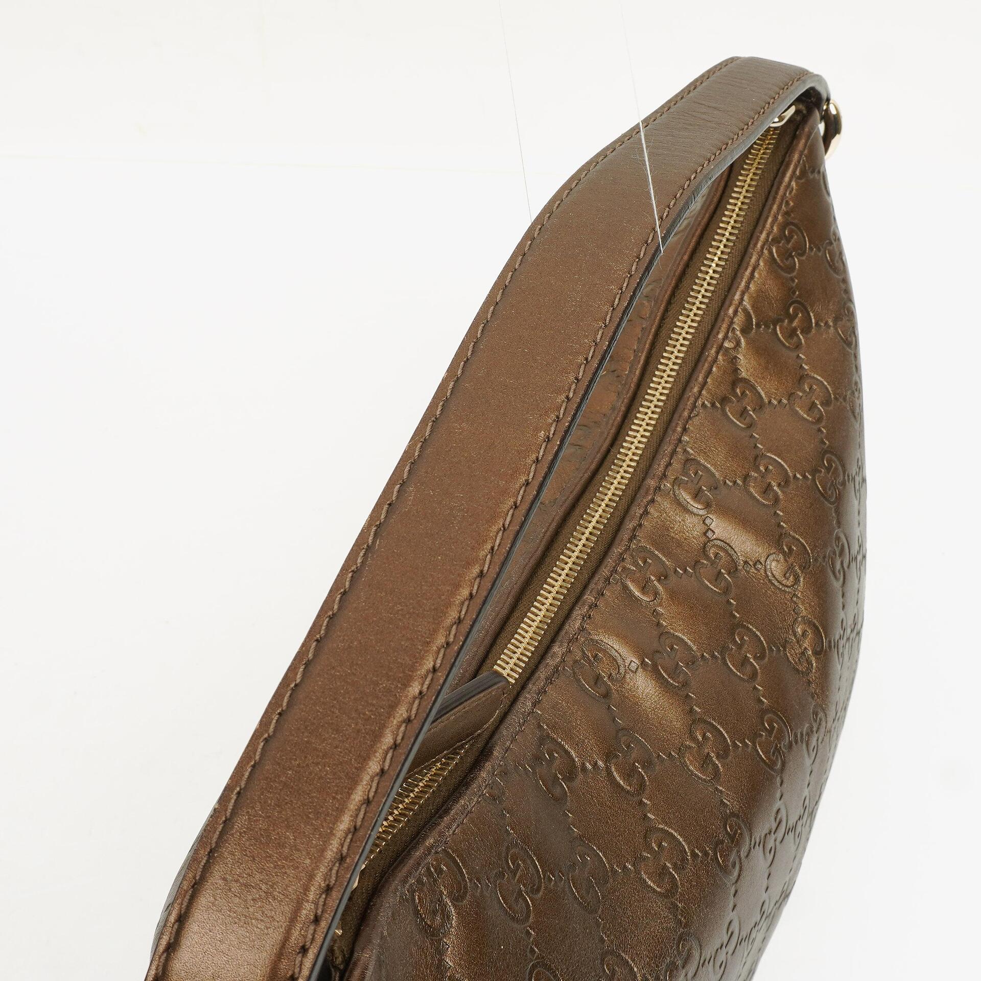Gucci Heart Bit Hobo-Tasche aus bronzefarbenem Metallic Guccissima Leder