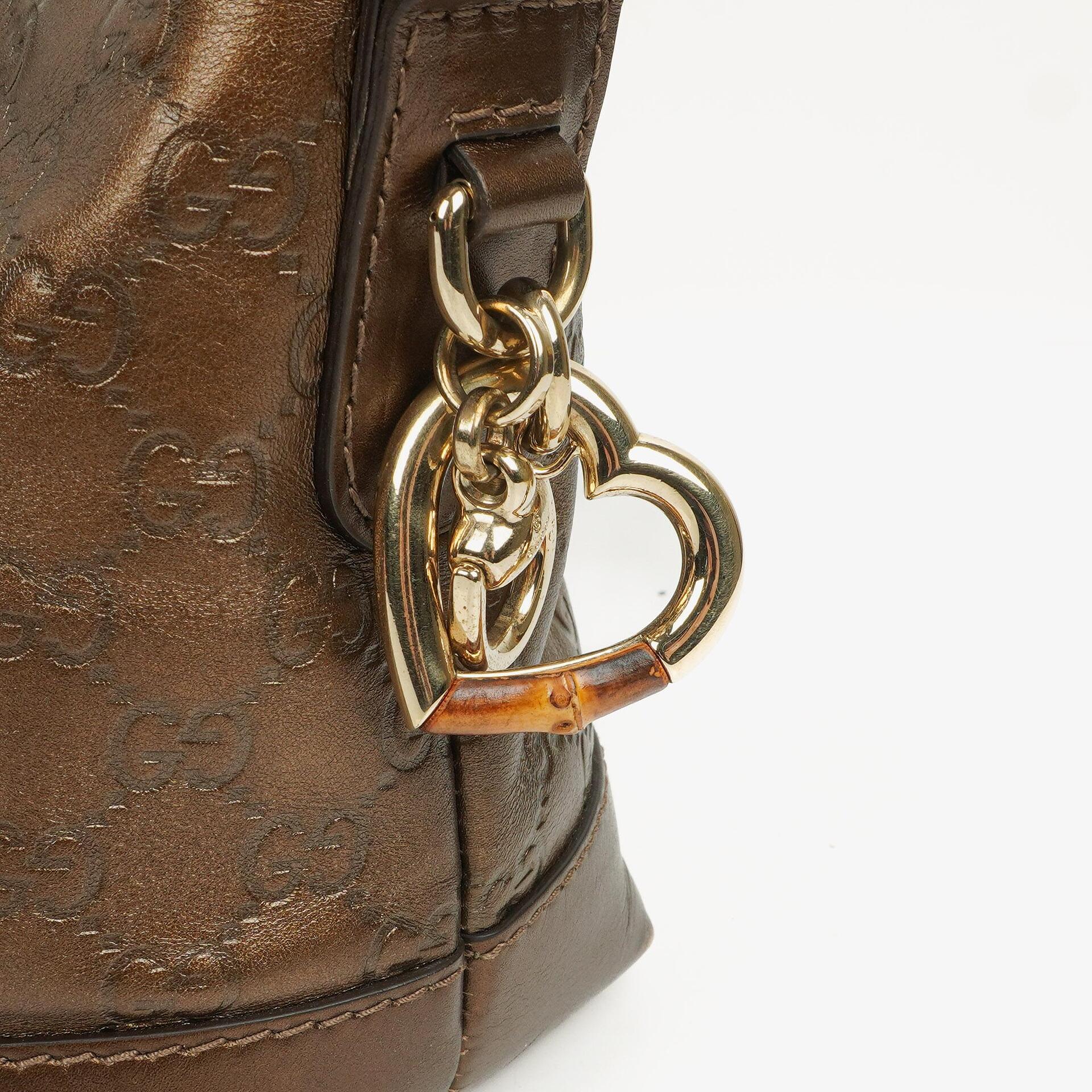 Gucci Heart Bit Hobo-Tasche aus bronzefarbenem Metallic Guccissima Leder