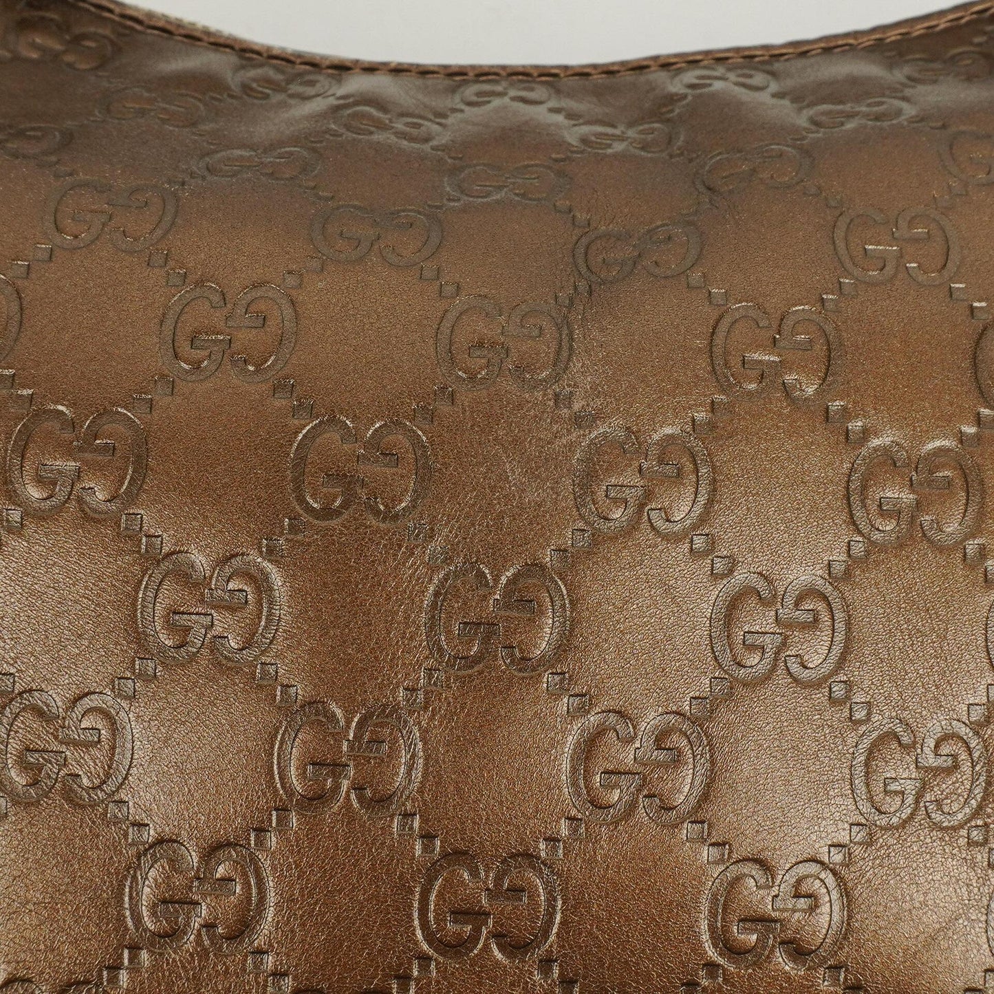 Gucci Heart Bit Hobo-Tasche aus bronzefarbenem Metallic Guccissima Leder