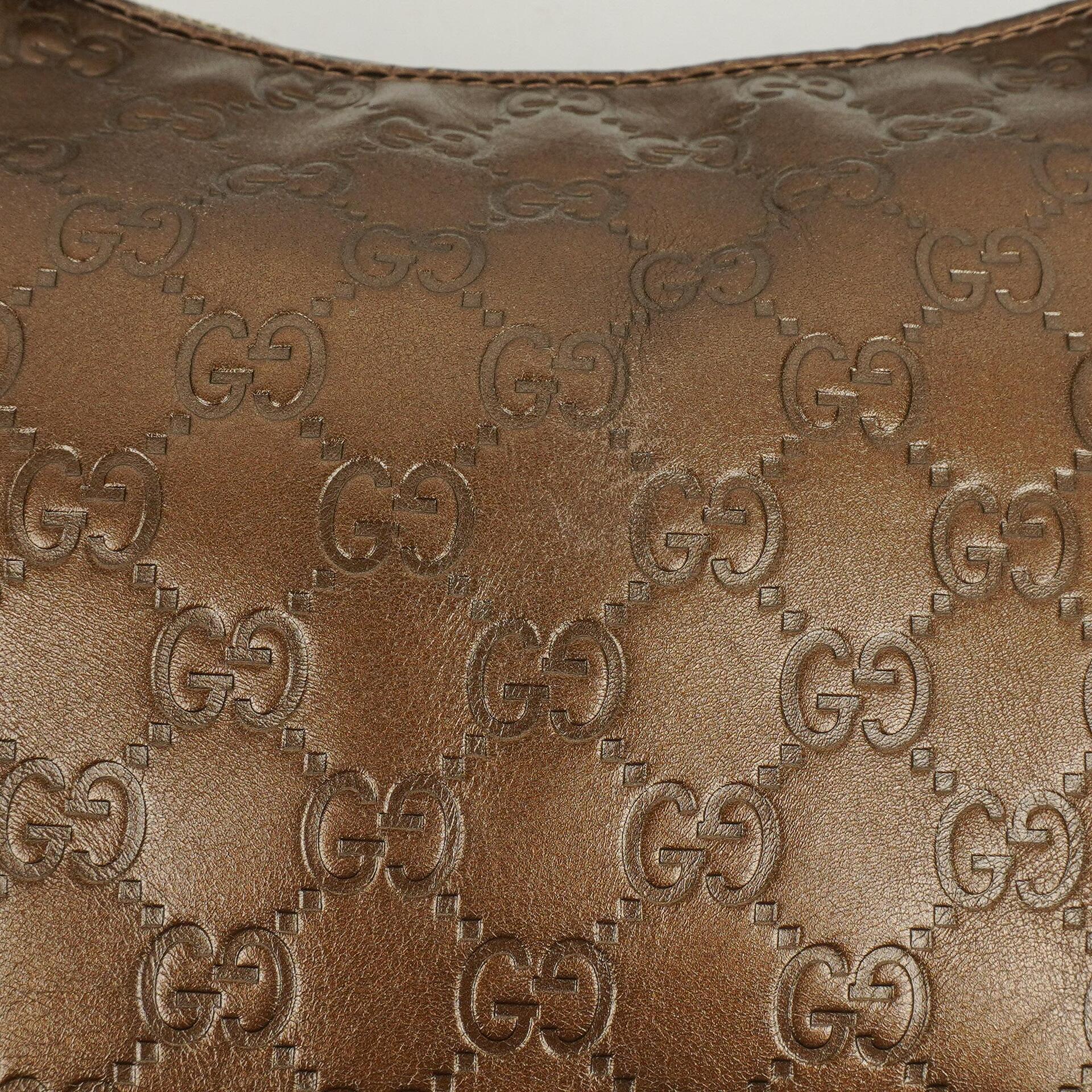 Gucci Heart Bit Hobo-Tasche aus bronzefarbenem Metallic Guccissima Leder