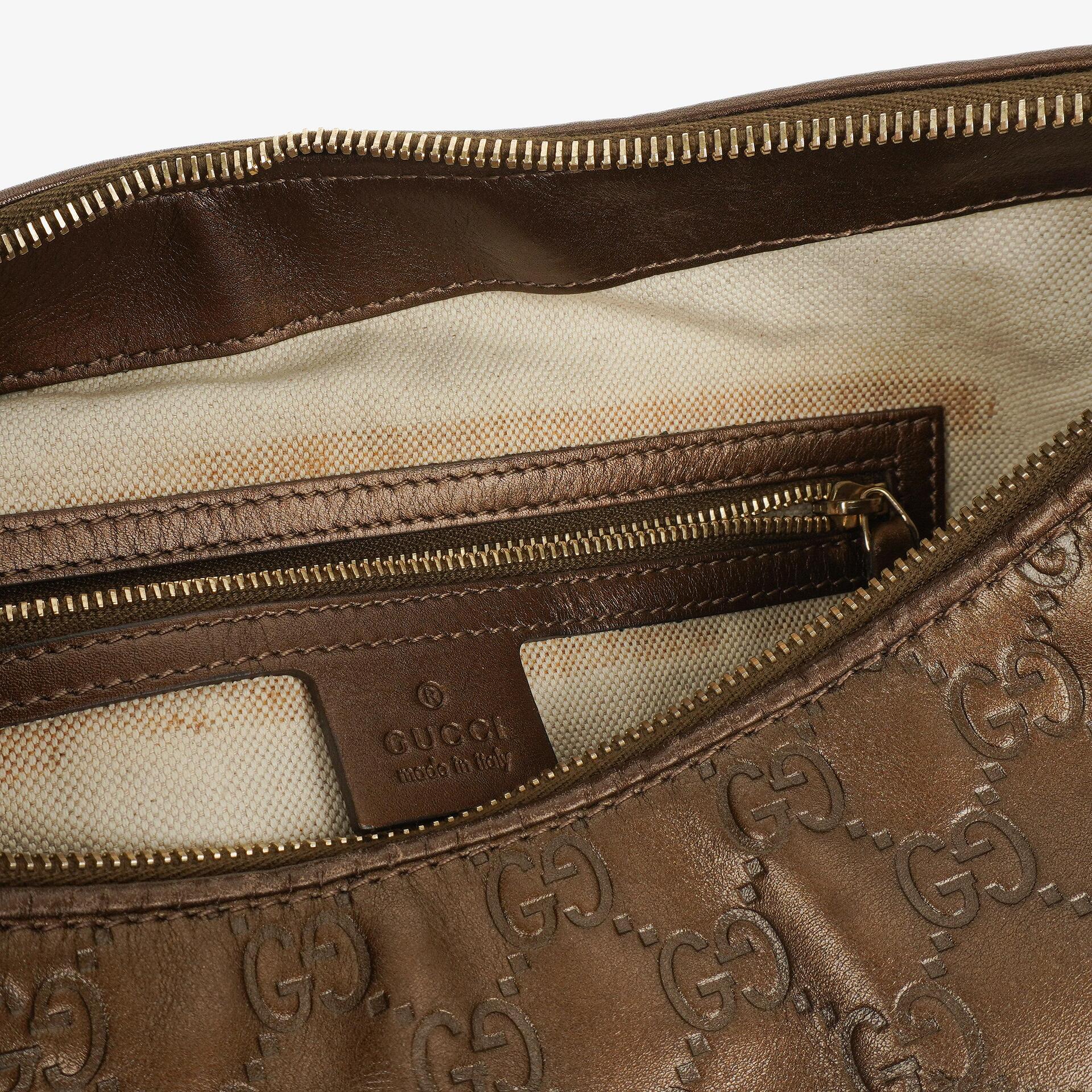 Gucci Heart Bit Hobo-Tasche aus bronzefarbenem Metallic Guccissima Leder
