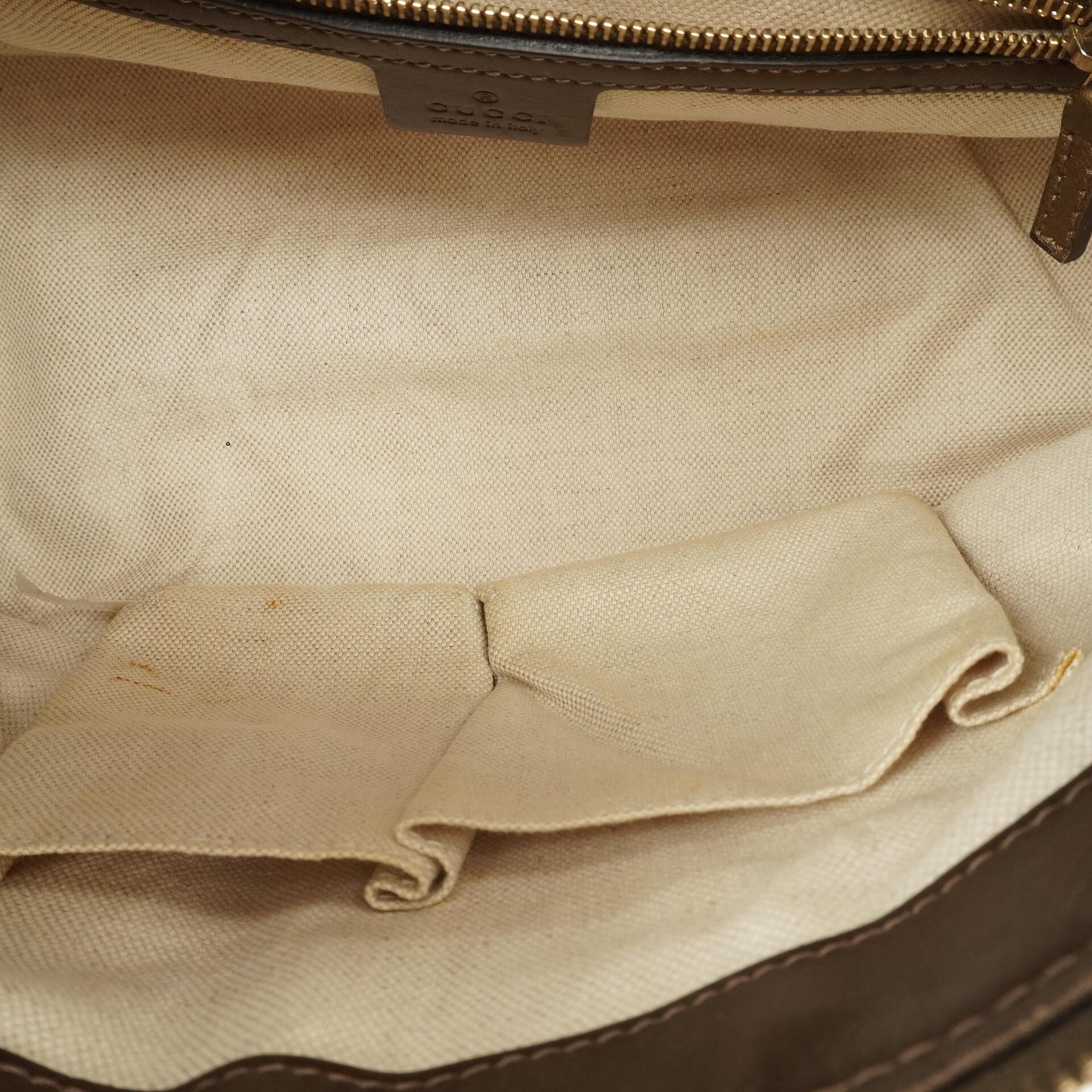 Gucci Heart Bit Hobo-Tasche aus bronzefarbenem Metallic Guccissima Leder