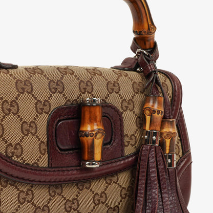 Gucci Medium New Convertible Bamboo Top Handle Tasche aus braunem GG Canvas