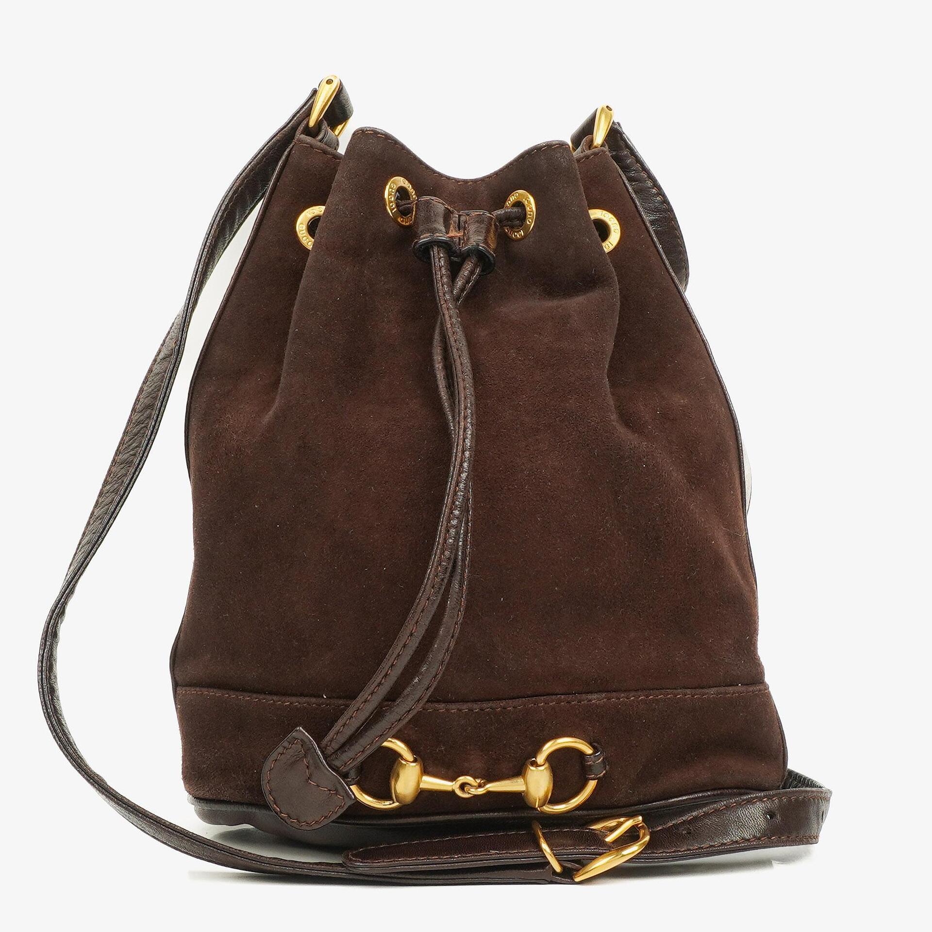 Gucci Bucket Bag aus braunem Leder und Wildleder mit Horsebit-Kette und Zugband