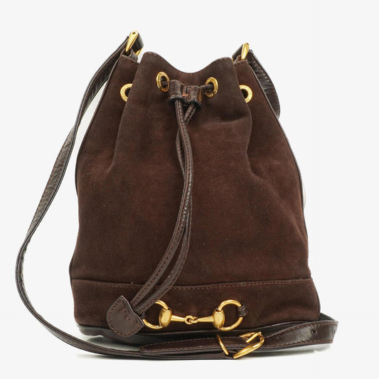 Gucci Bucket Bag aus braunem Leder und Wildleder mit Horsebit-Kette und Zugband