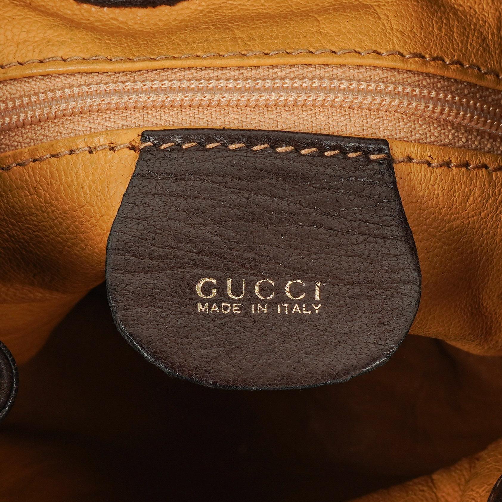 Gucci Bucket Bag aus braunem Leder und Wildleder mit Horsebit-Kette und Zugband