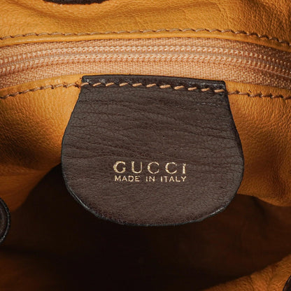 Gucci Bucket Bag aus braunem Leder und Wildleder mit Horsebit-Kette und Zugband