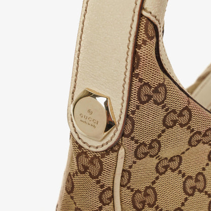 Gucci Charmy Hobo-Tasche aus beigem GG Canvas