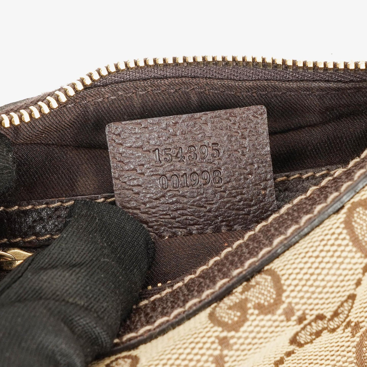 Gucci Charmy Hobo-Tasche aus beigem GG Canvas