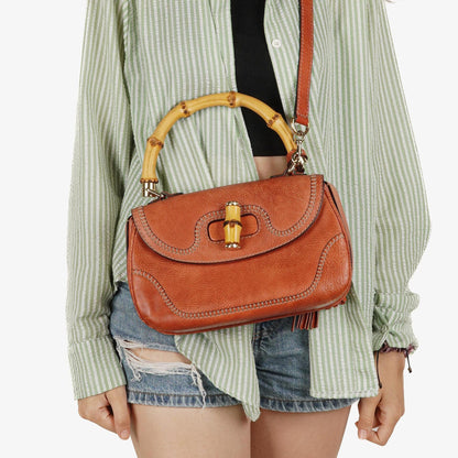 Gucci Medium New Convertible Bamboo Top Handle Tasche aus genarbtem Kalbsleder in Koralle