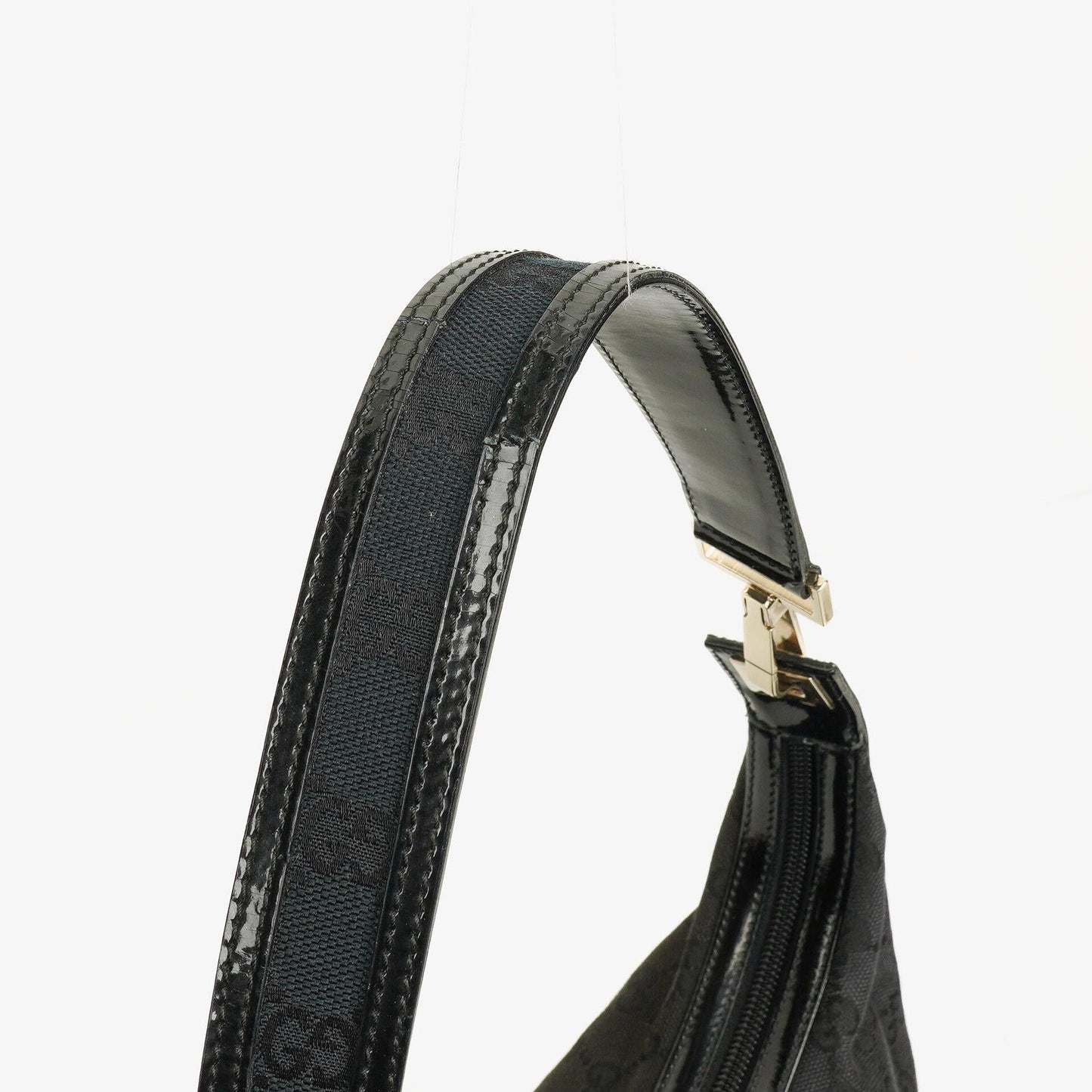Gucci Hobo Schultertasche aus schwarzem GG Canvas und Lackleder