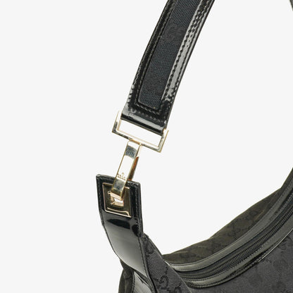 Gucci Hobo Schultertasche aus schwarzem GG Canvas und Lackleder