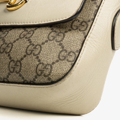 Gucci Horsebit 1955 kleine Schultertasche aus GG Supreme Monogram