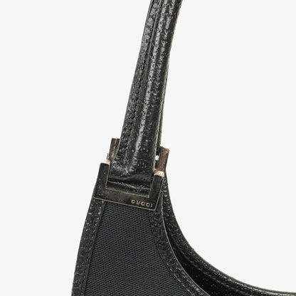 Gucci Jackie Schultertasche aus schwarzem Canvas