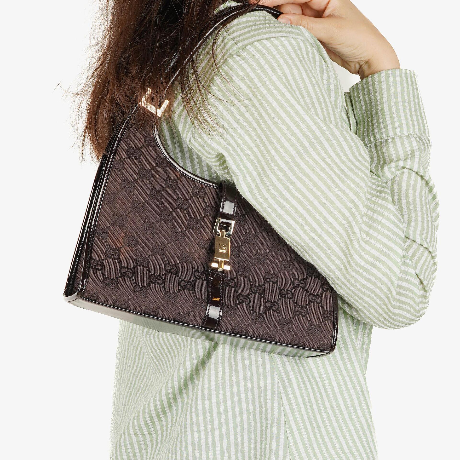 Gucci Jackie Schultertasche aus lila GG Canvas