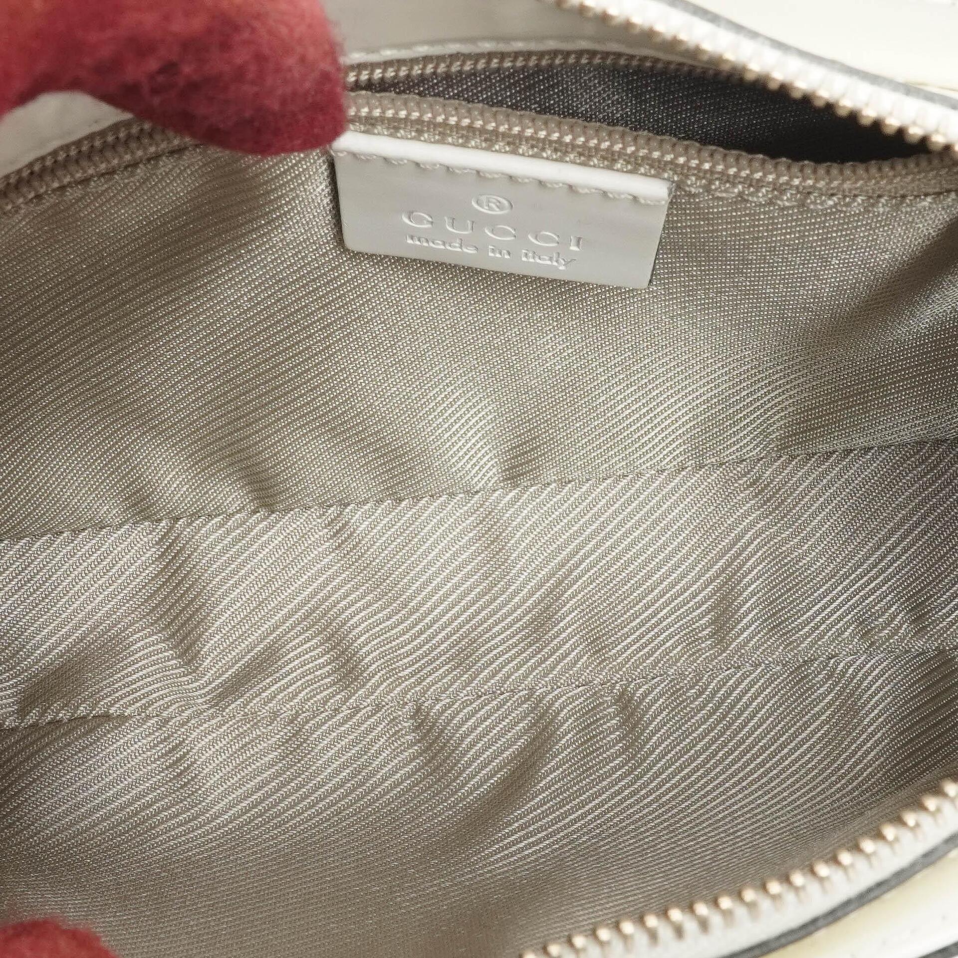 Gucci Microguccissima Pochette aus weißem Leder