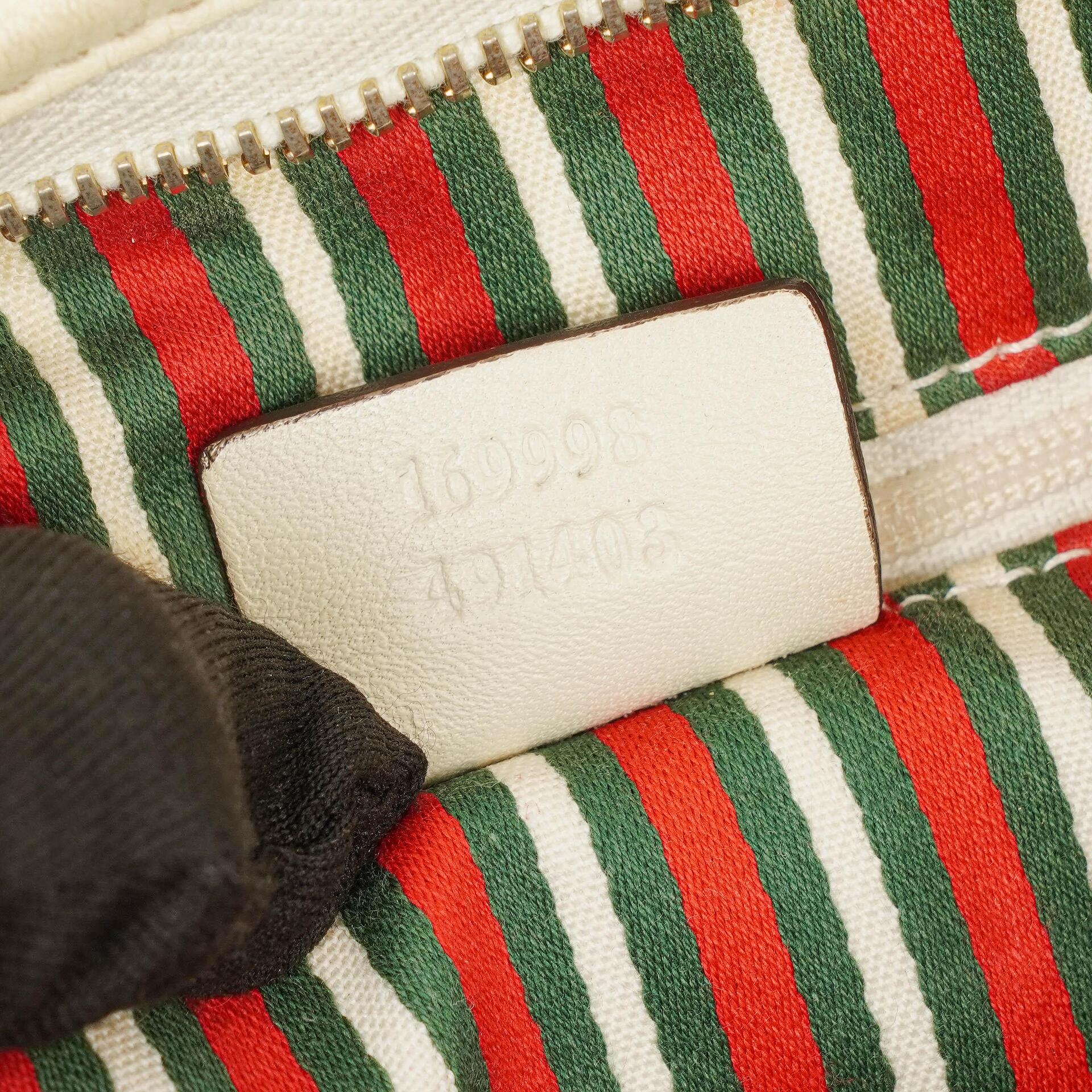 Gucci New Britt mittelgroße Halbmond-Hobo-Tasche mit Monogramm