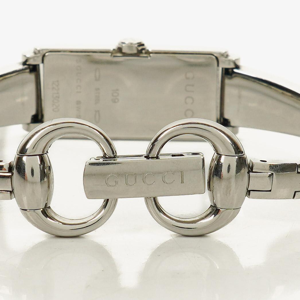 Gucci 109 Damenarmbanduhr aus silberfarbenem Edelstahl
