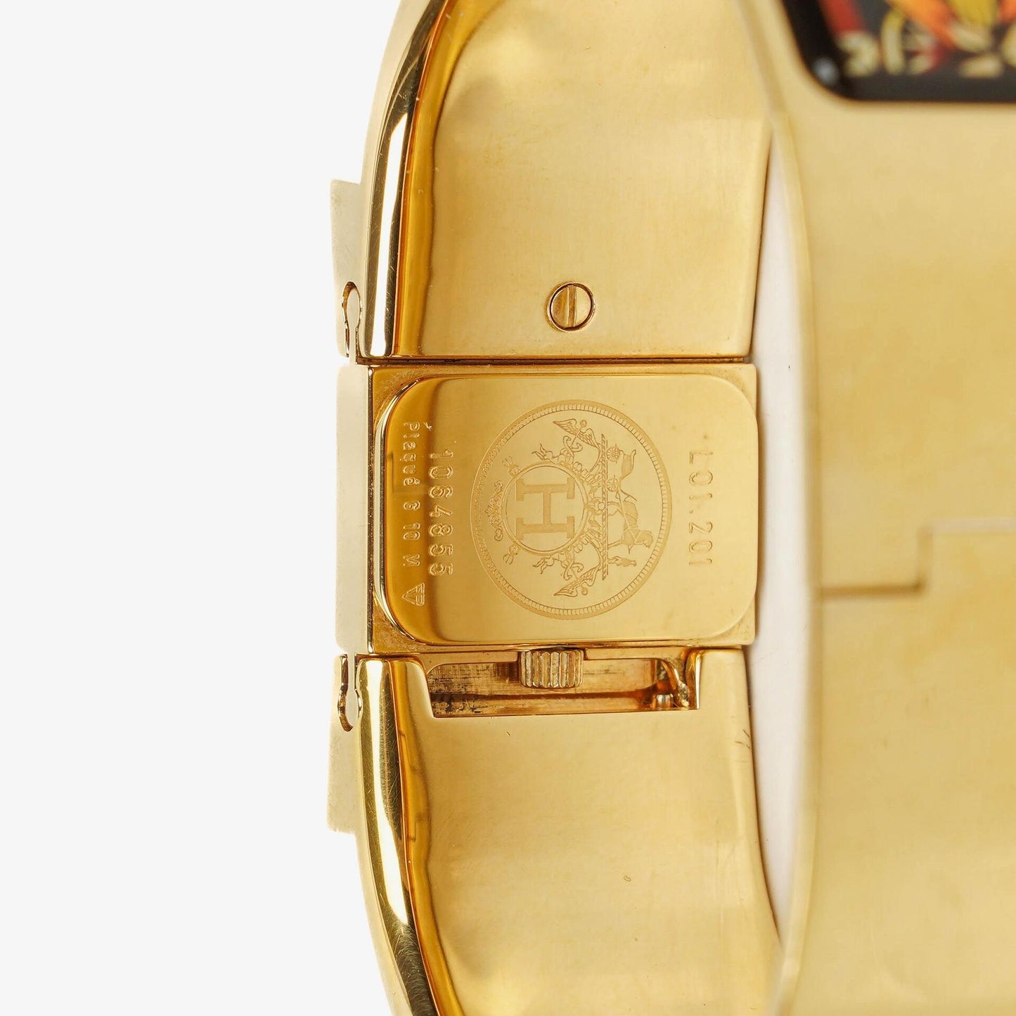 Hermès Loquet L01.201 Armreif-Quarzuhr aus schwarzer Reitsport-Emaille und vergoldetem Metall