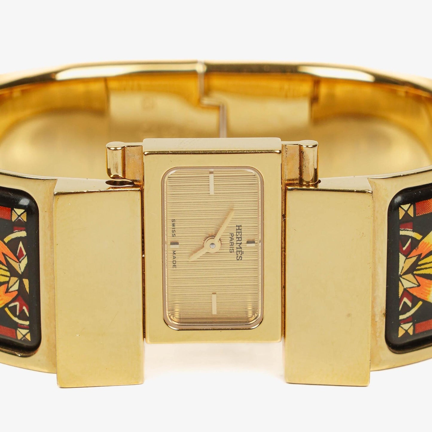 Hermès Loquet L01.201 Armreif-Quarzuhr aus schwarzer Reitsport-Emaille und vergoldetem Metall