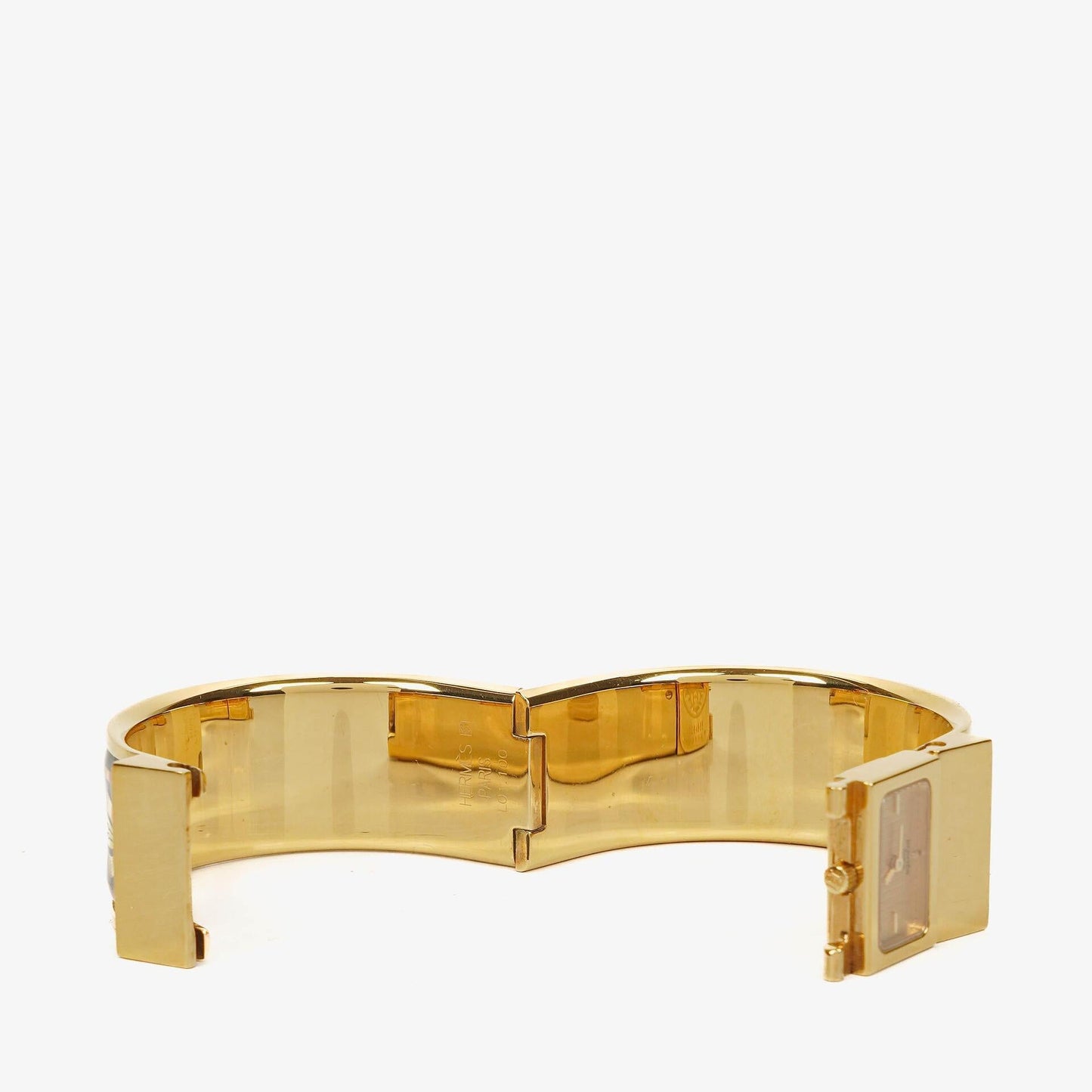 Hermès Loquet L01.201 Armreif-Quarzuhr aus schwarzer Reitsport-Emaille und vergoldetem Metall