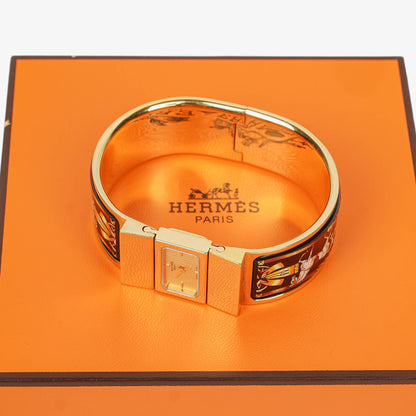 Hermès Loquet L01.201 Armreif-Quarzuhr aus schwarzer Reitsport-Emaille und vergoldetem Metall