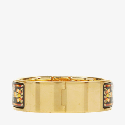 Hermès Loquet L01.201 Armreif-Quarzuhr aus schwarzem Reitsport-Emaille und vergoldetem Metall