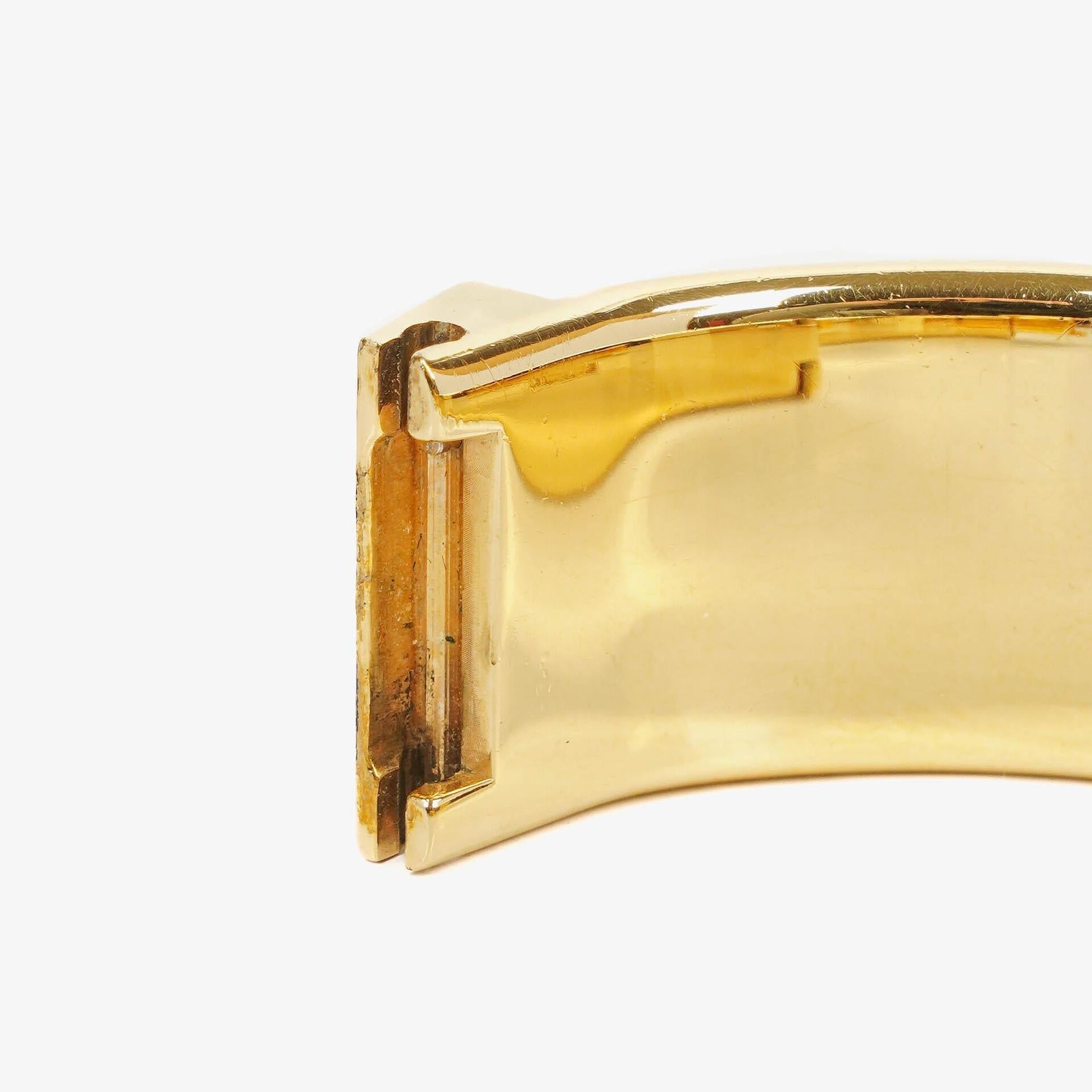 Hermès Loquet L01.201 Armreif-Quarzuhr aus schwarzem Reitsport-Emaille und vergoldetem Metall