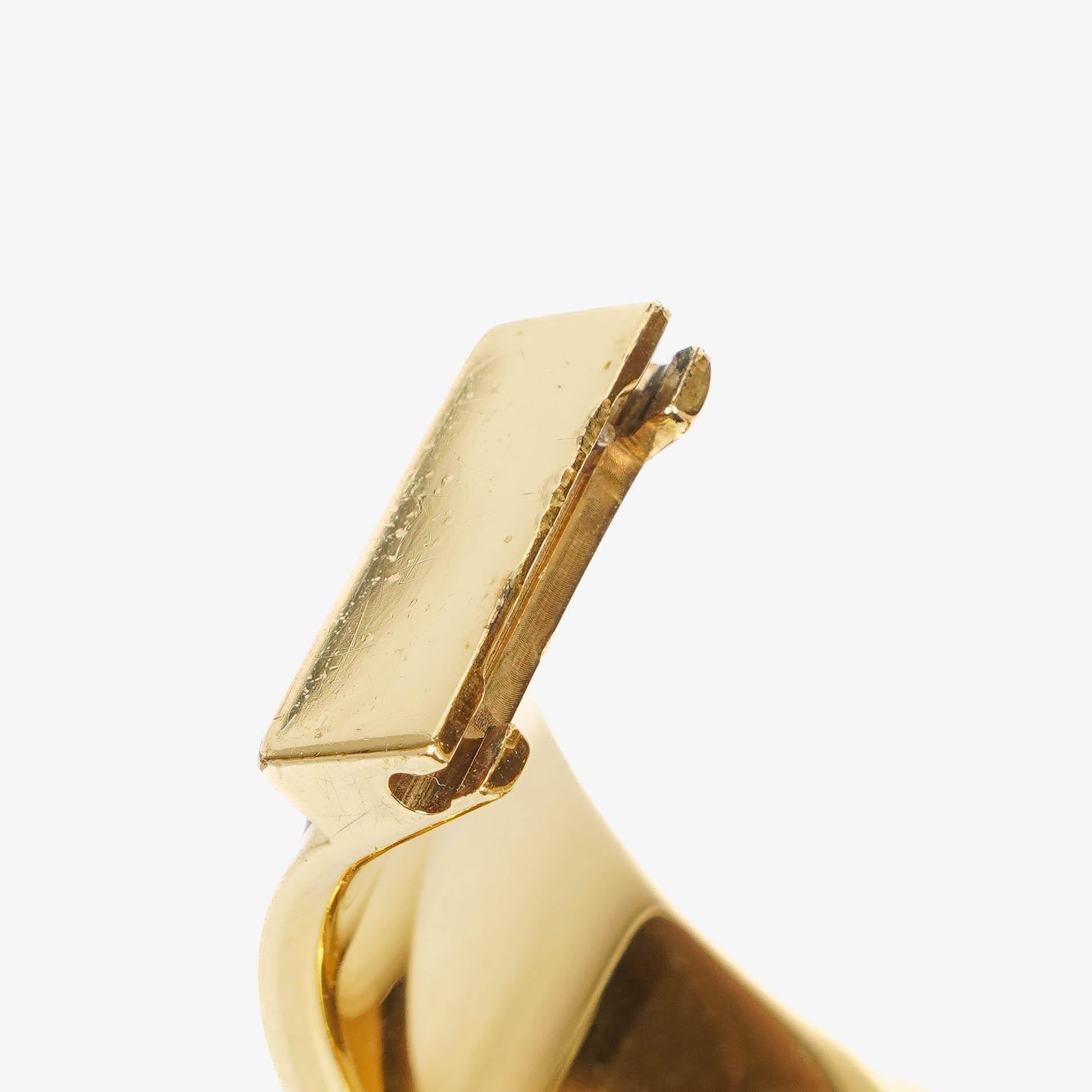 Hermès Loquet L01.201 Armreif-Quarzuhr aus schwarzem Reitsport-Emaille und vergoldetem Metall