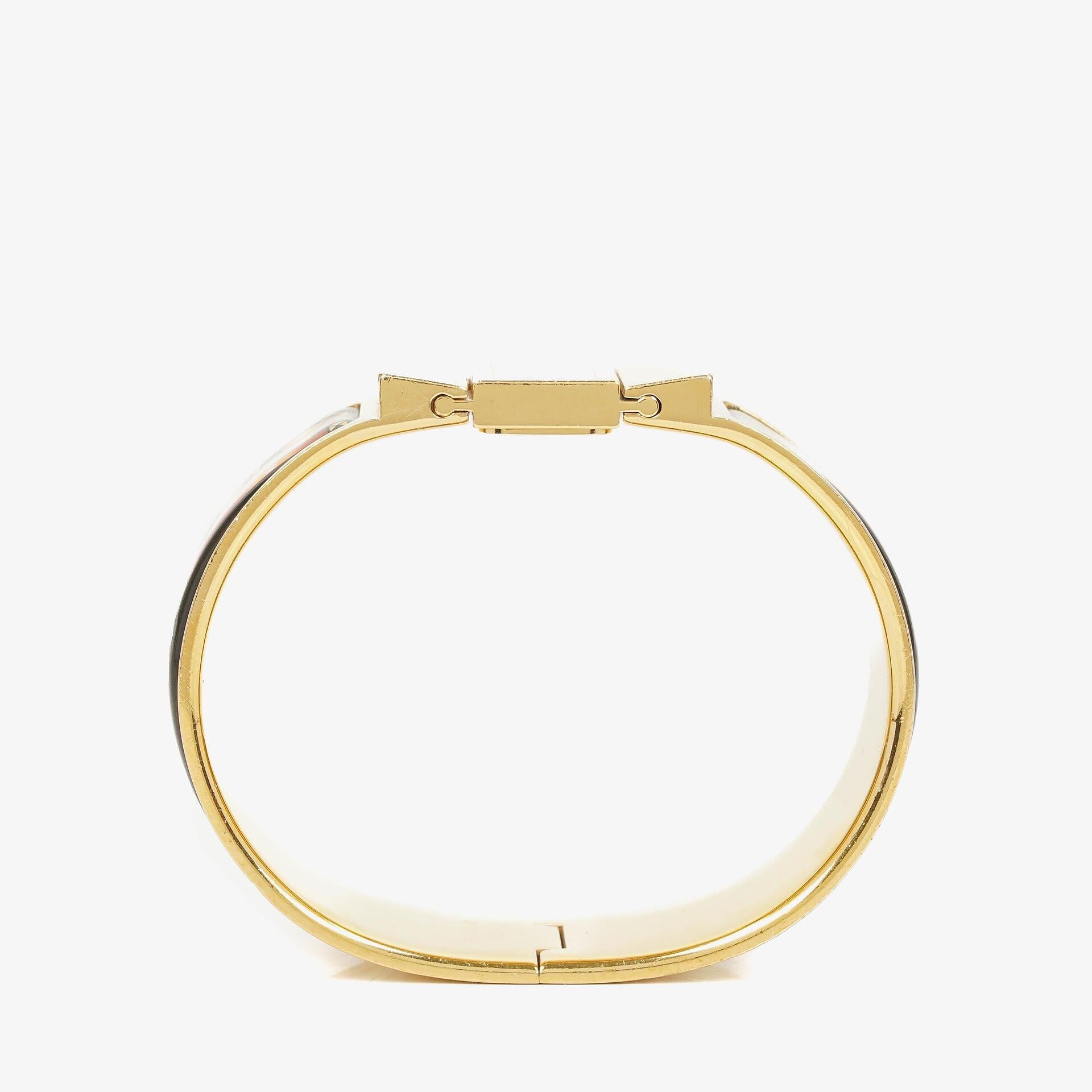 Hermès Loquet L01.201 Armreif-Quarzuhr aus schwarzem Reitsport-Emaille und vergoldetem Metall