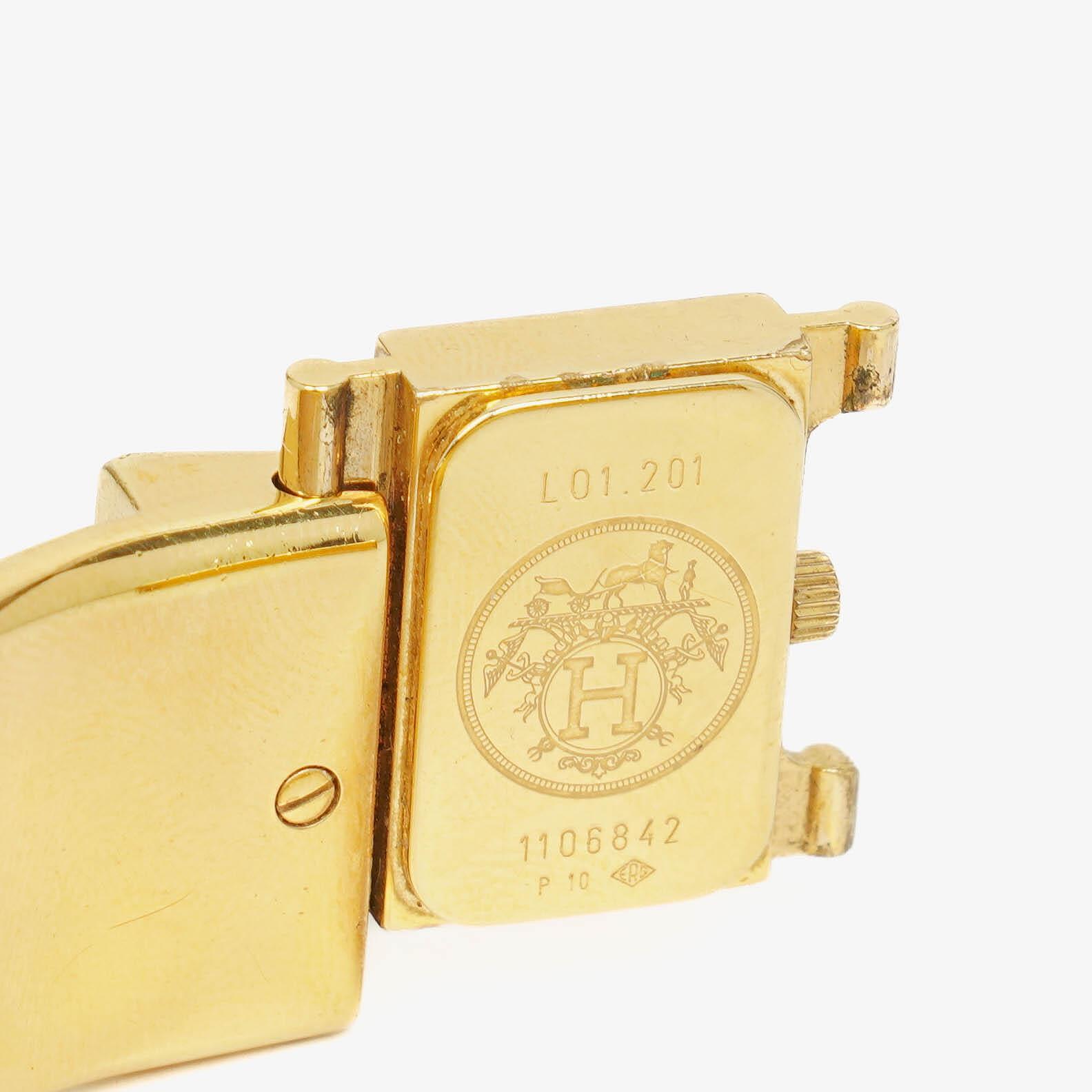 Hermès Loquet L01.201 Armreif-Quarzuhr mit schwarzem Equestrian-Emaille und Vergoldung