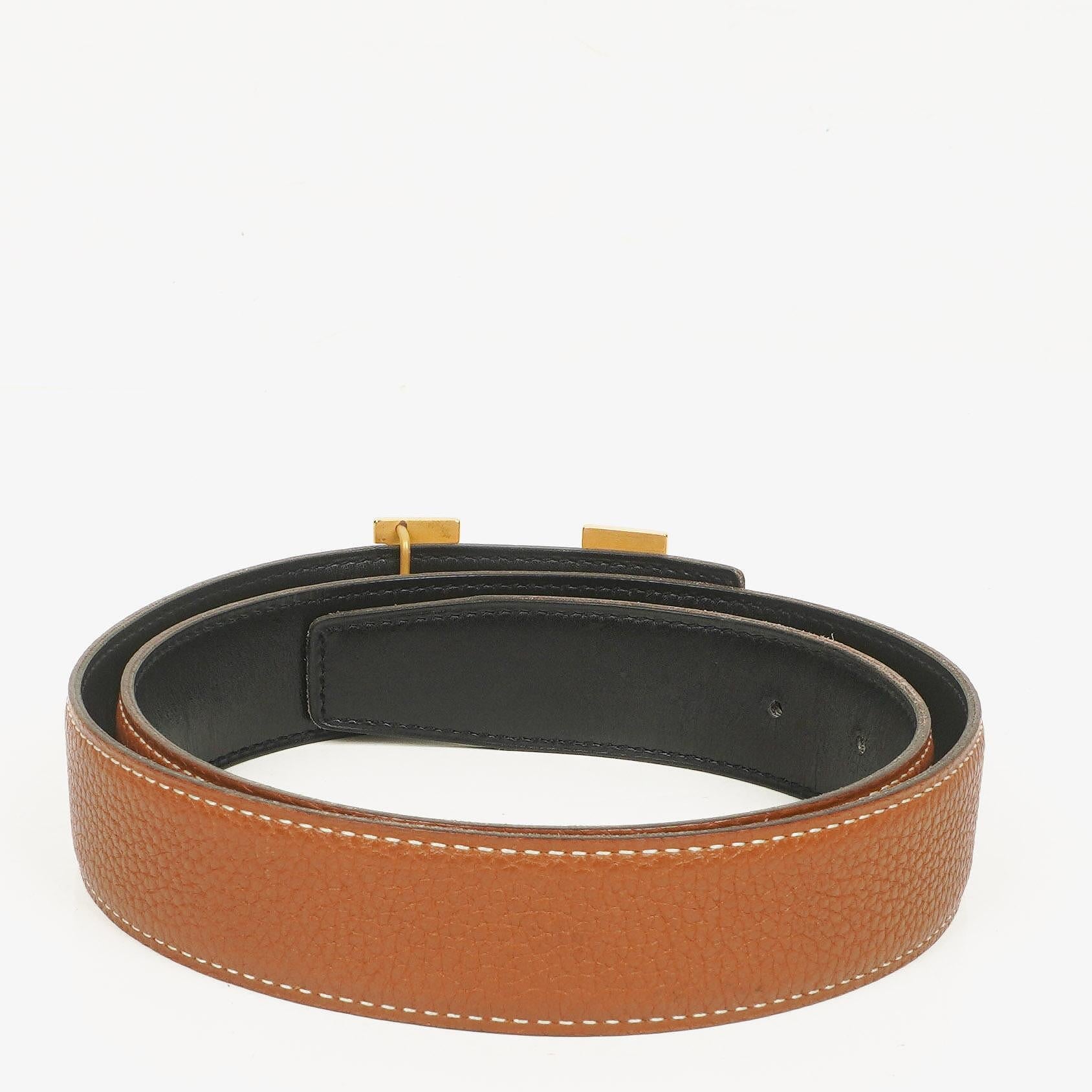 Hermès H Wendegürtel 85 aus Box- und Togo-Leder in Schwarz/Gold, 30 mm