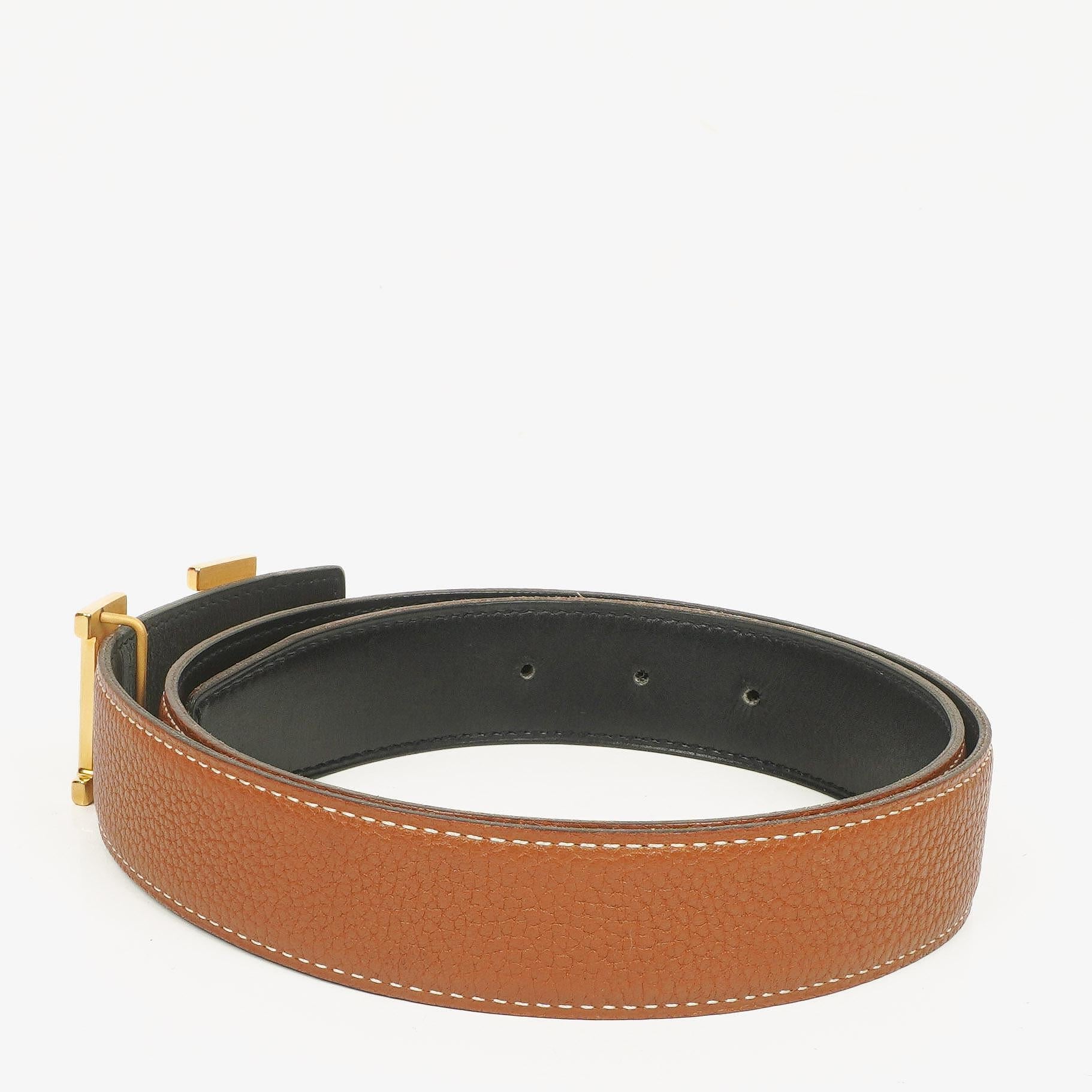 Hermès H Wendegürtel 85 aus Box- und Togo-Leder in Schwarz/Gold, 30 mm