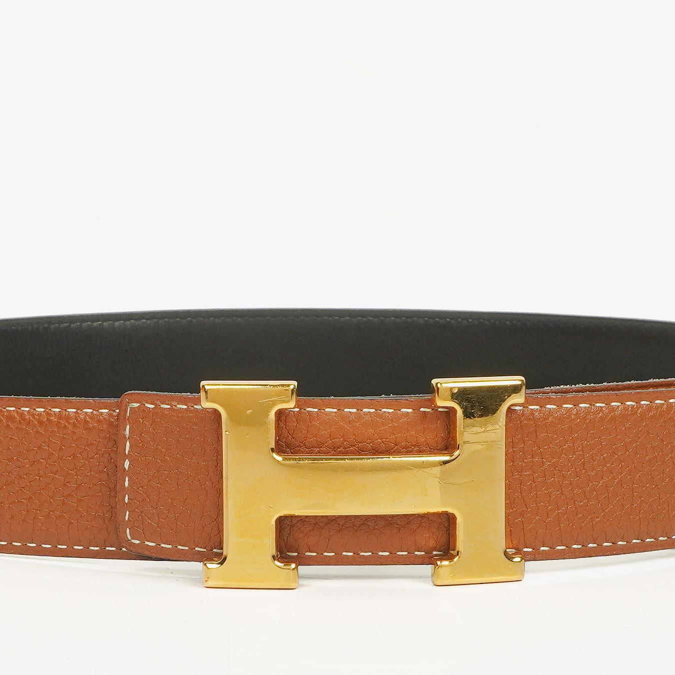 Hermès H Wendegürtel 85 aus Box- und Togo-Leder in Schwarz/Gold, 30 mm