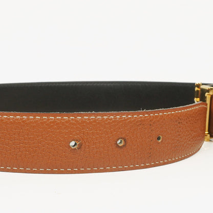 Hermès H Wendegürtel 85 aus Box- und Togo-Leder in Schwarz/Gold, 30 mm