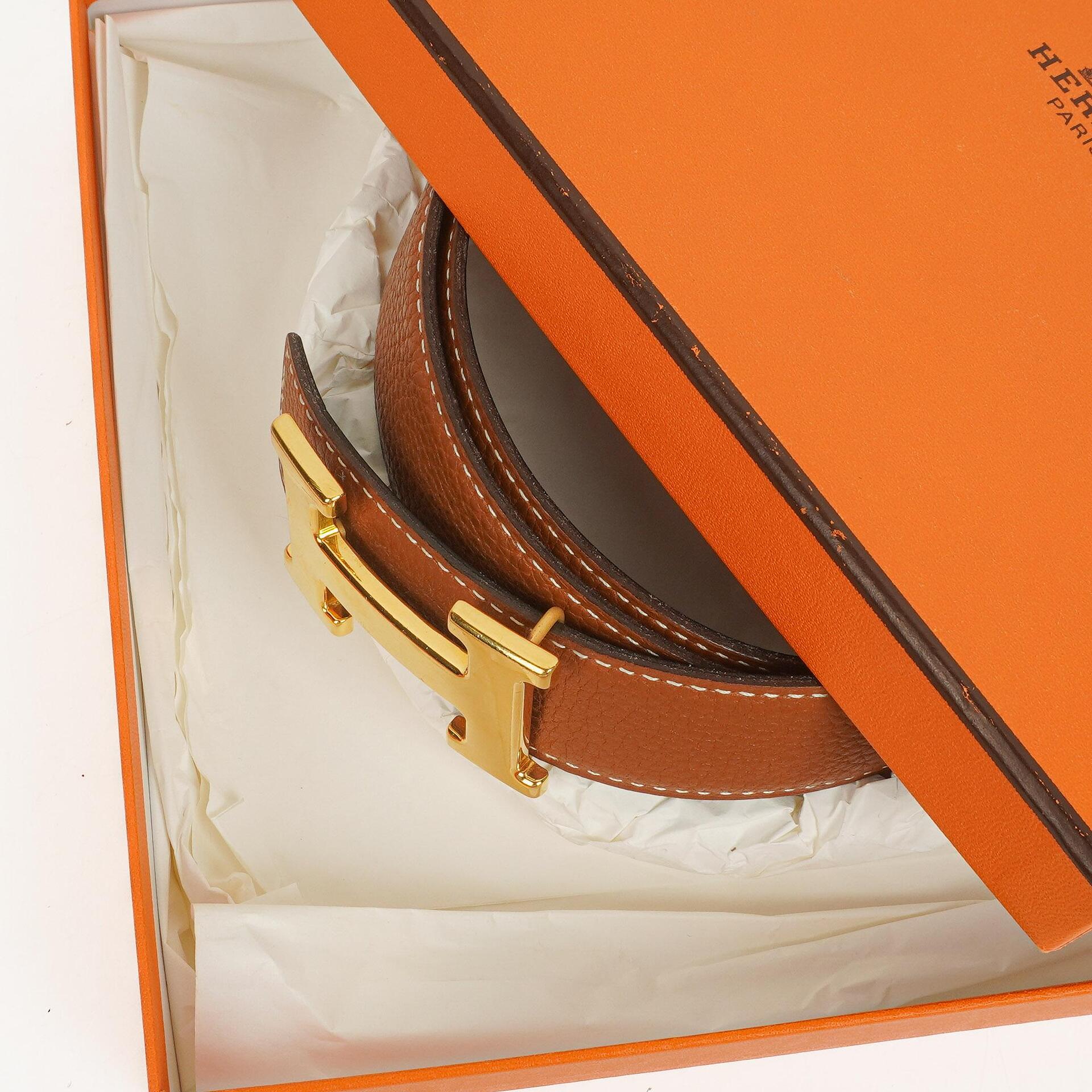 Hermès H Wendegürtel 85 aus Box- und Togo-Leder in Schwarz/Gold, 30 mm