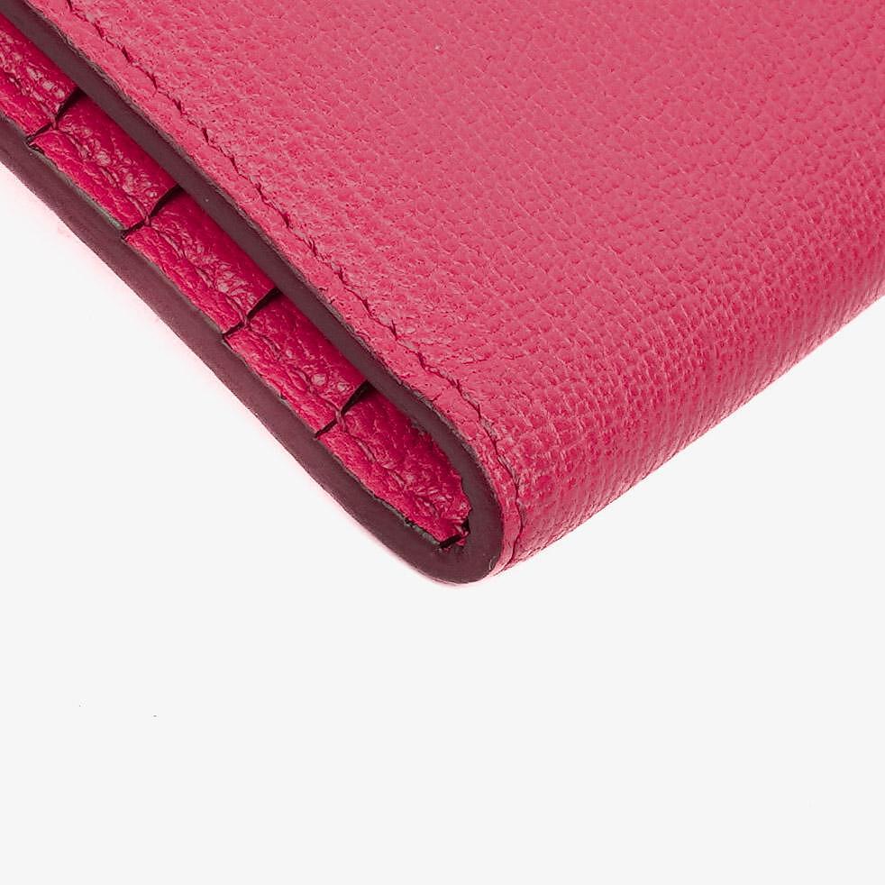Hermès Kelly Longue Geldbörse aus Chevre Mysore in Rose Shocking