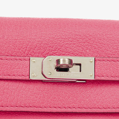 Hermès Kelly Longue Geldbörse aus Chevre Mysore in Rose Shocking