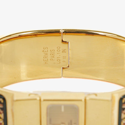 Hermès Loquet Armreif-Quarzuhr L01.100 mit grünem Equestrian Emaille und vergoldetem Finish