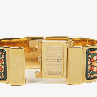 Hermès Loquet L01.100 Armreif-Quarzuhr mit grünem Equestrian-Emaille und Vergoldung