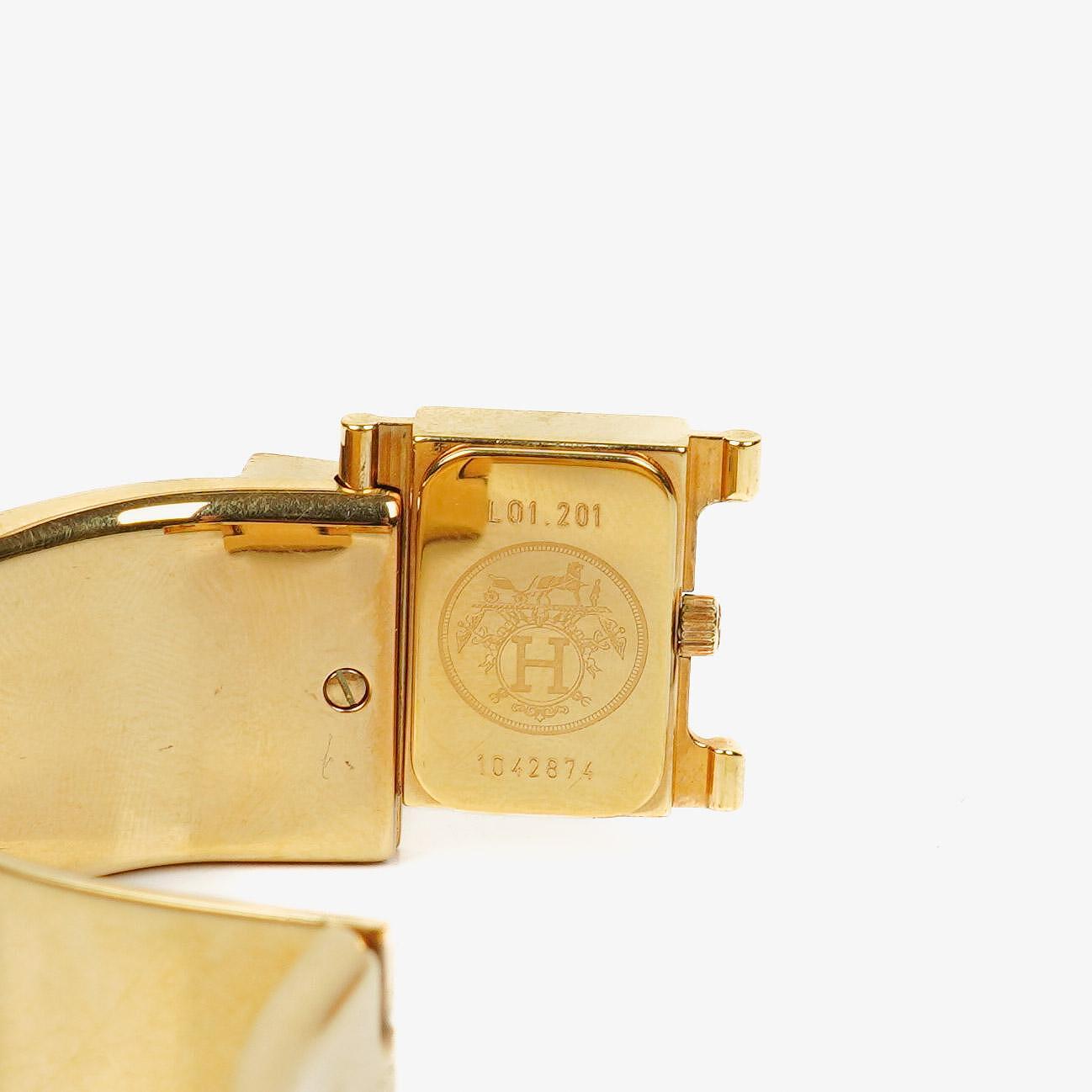 Hermes Grünes Reitsport Emaille und Vergoldetes Loquet Armreif Quarzuhr L01.201