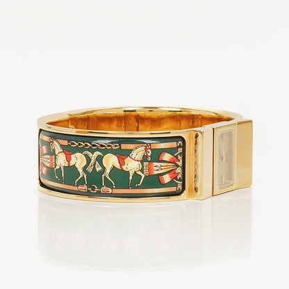 Hermès Loquet L01.201 Armreif-Quarzuhr mit grünem Reitsport-Emaille und Vergoldung
