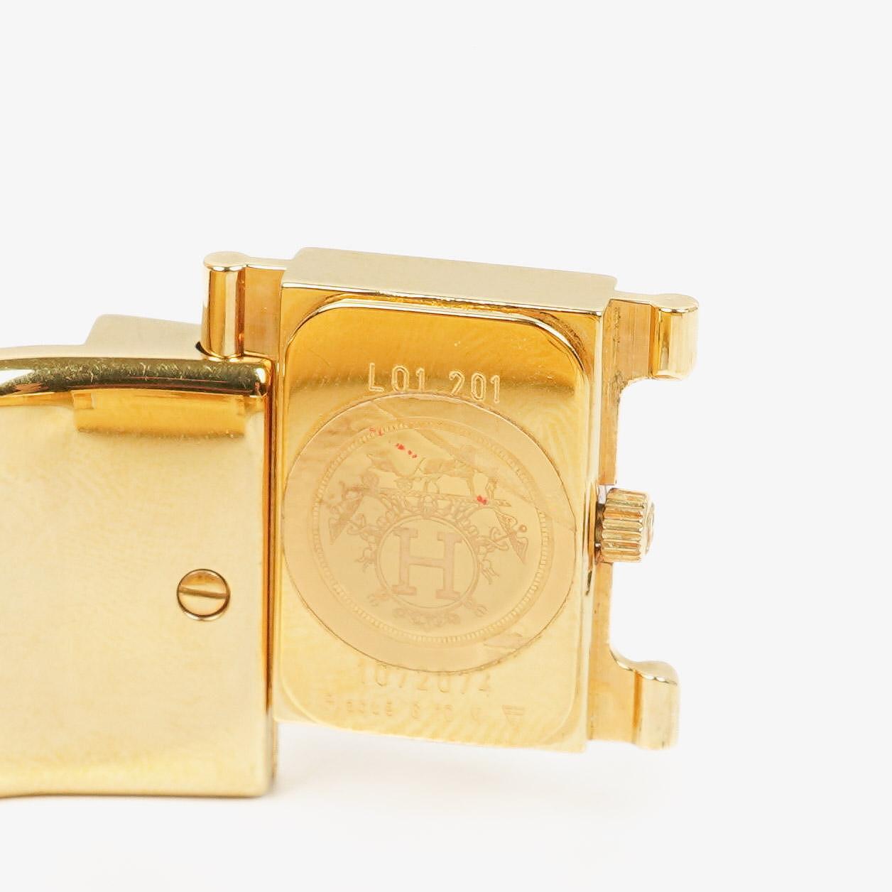 Hermès Loquet L01.201 Armreif-Quarzuhr mit grünem Reitsport-Emaille und Vergoldung