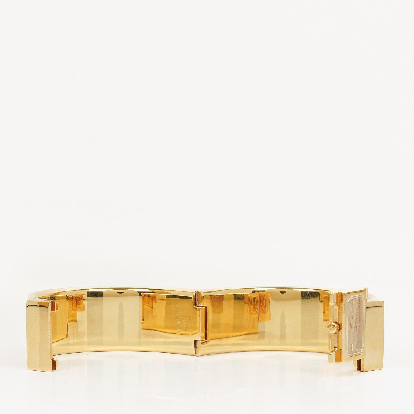 Hermès Loquet L01.201 Armreif-Quarzuhr mit grünem Reitsport-Emaille und Vergoldung