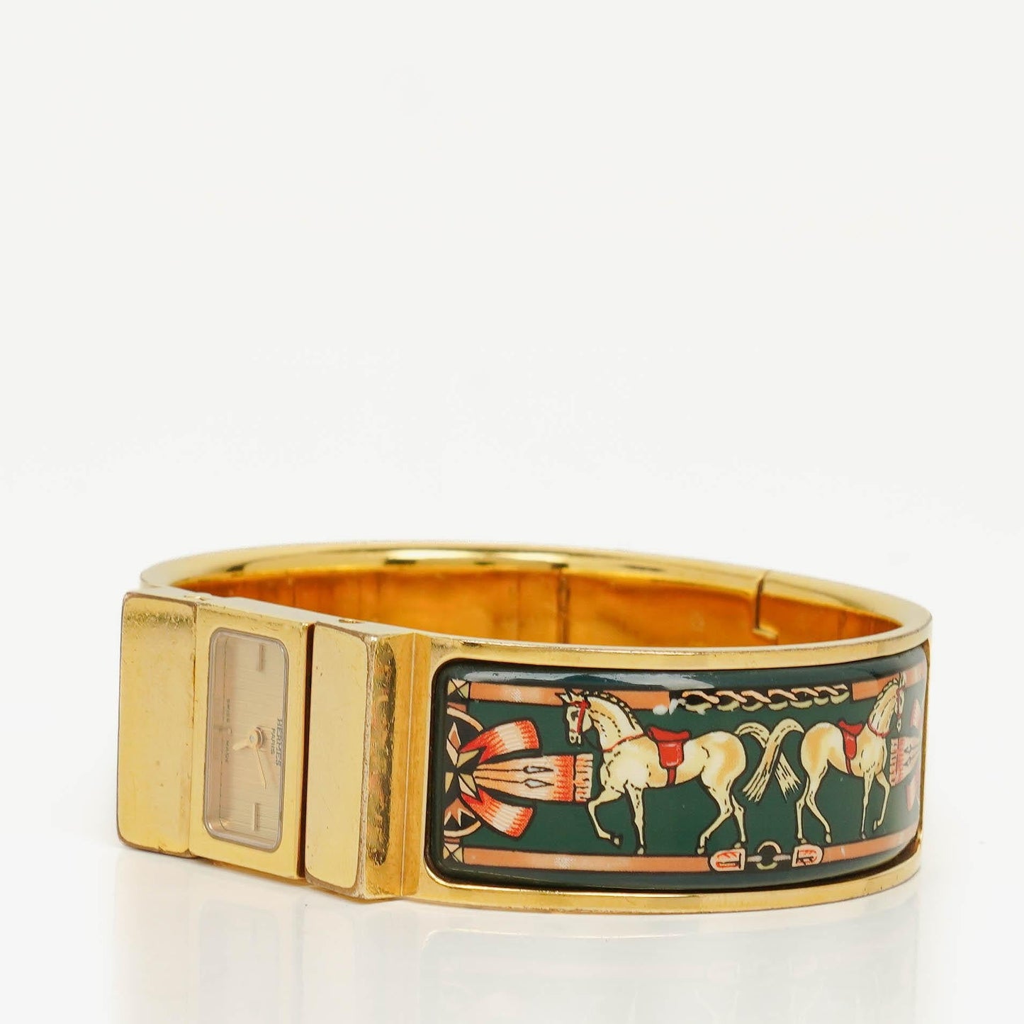 Hermès Loquet Armreif-Quarzuhr L01.201 mit grünem Reitsport-Emaille und Vergoldung