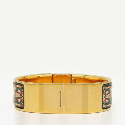 Hermès Loquet Armreif-Quarzuhr L01.201 mit grünem Reitsport-Emaille und Vergoldung