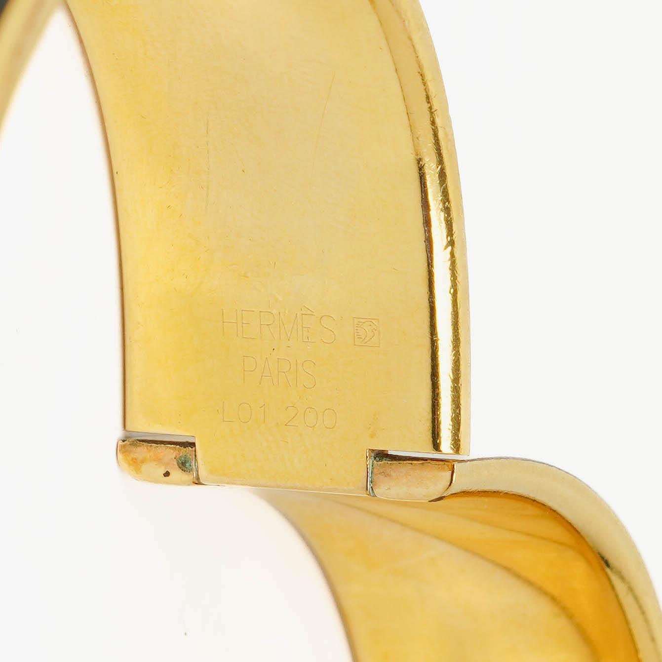 Hermès Loquet Armreif-Quarzuhr L01.201 mit grünem Reitsport-Emaille und Vergoldung