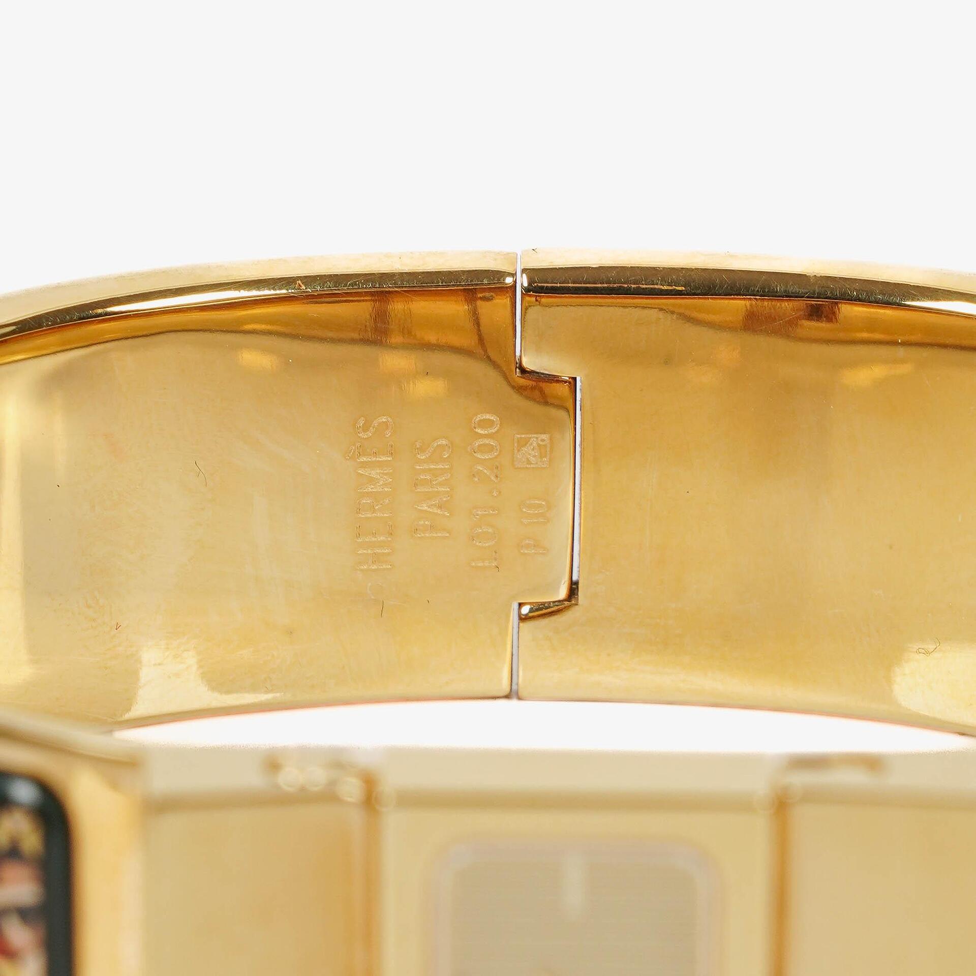 Hermès Loquet L01.201 Armreif-Quarzuhr mit grünem Reitsport-Emaille und Vergoldung