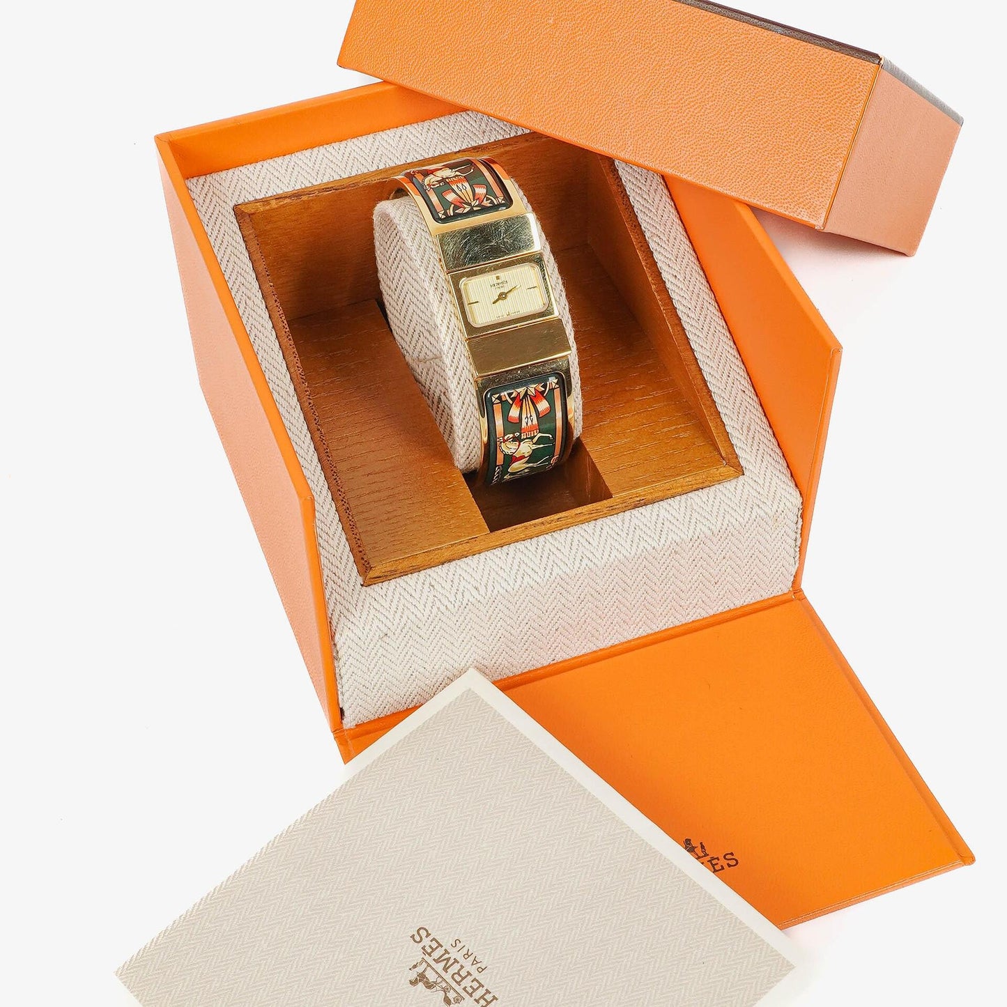 Hermès Loquet L01.201 Armreif-Quarzuhr mit grünem Reitsport-Emaille und Vergoldung